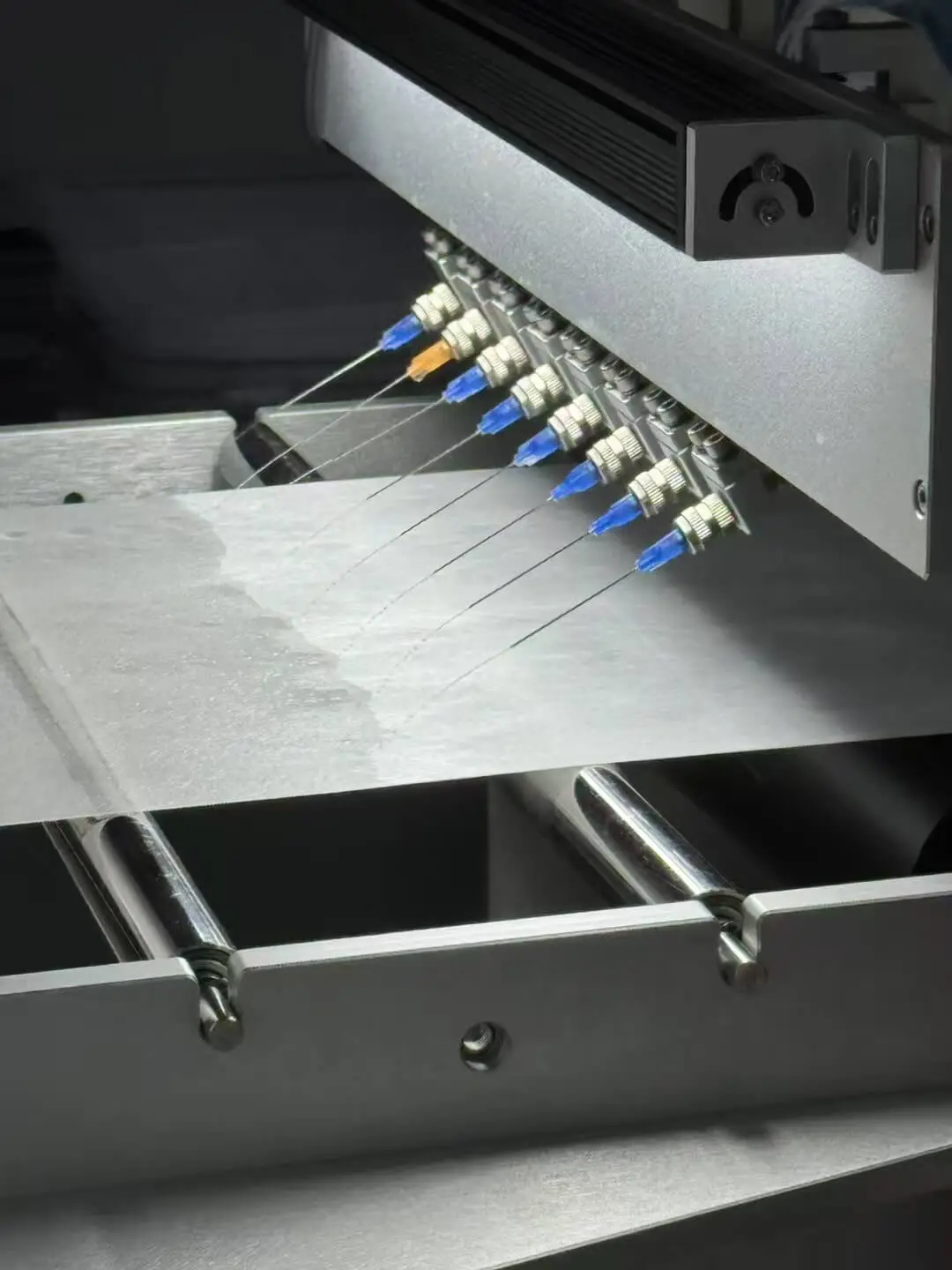 A clean, modern laboratory with automated equipment, representing the NomoFlow platform.